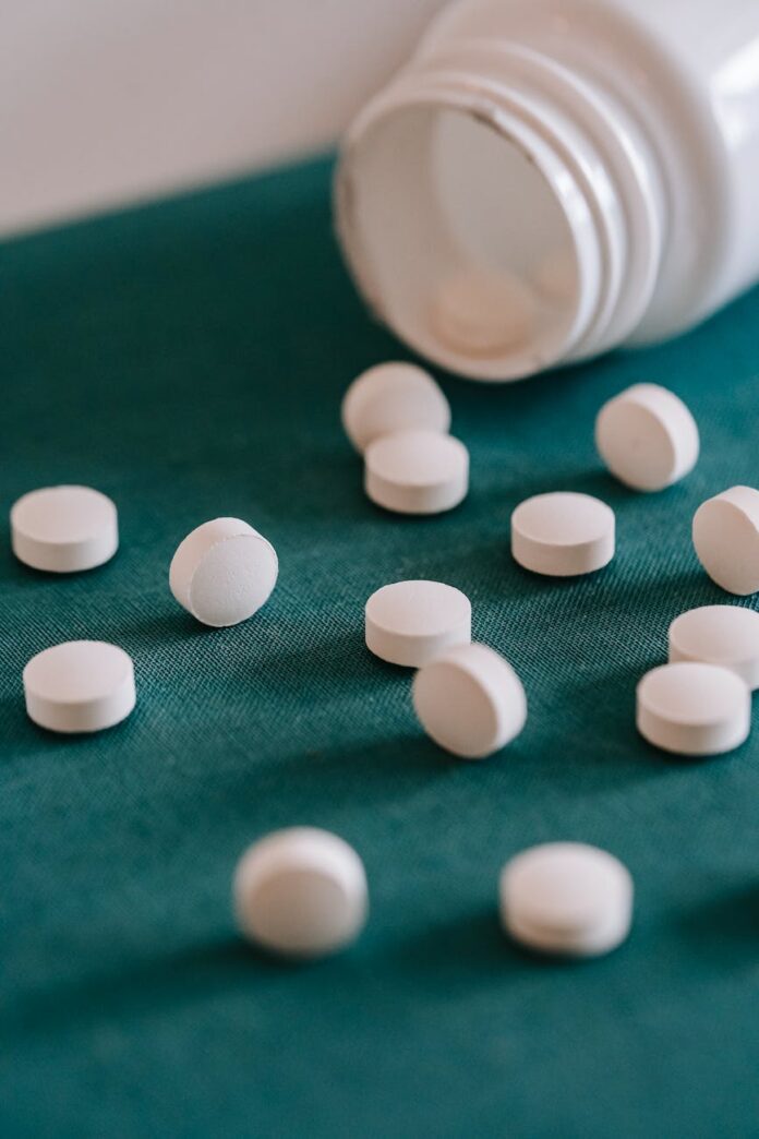 heap of pills spilled from container