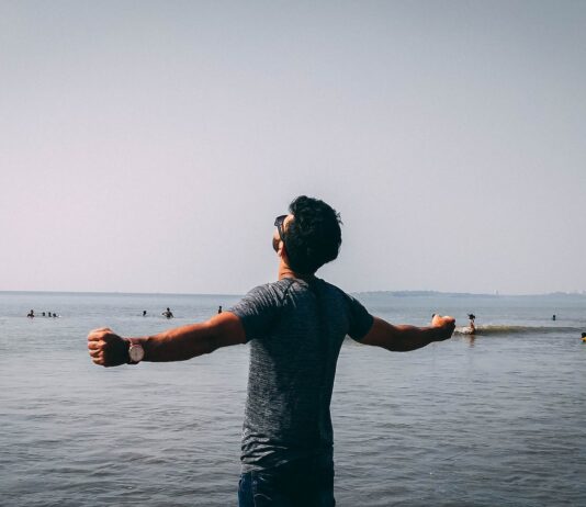 Alcohol-Free Living: The Benefits of Sobriety photo of man wearing gray shirt near sea